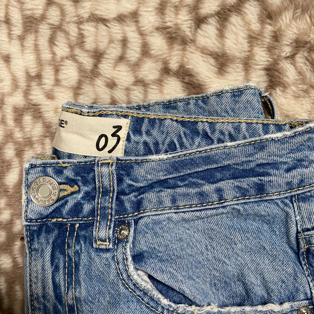 Ripped blue jeans